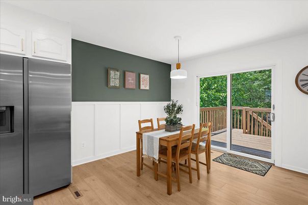Dining room, Interior, Pendant Lights, Stainless Steel Appliances, Wood Texture Flooring