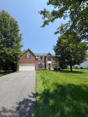 Attached, Backyard, Exterior, Facade, Brick Facade, Brick Traditional