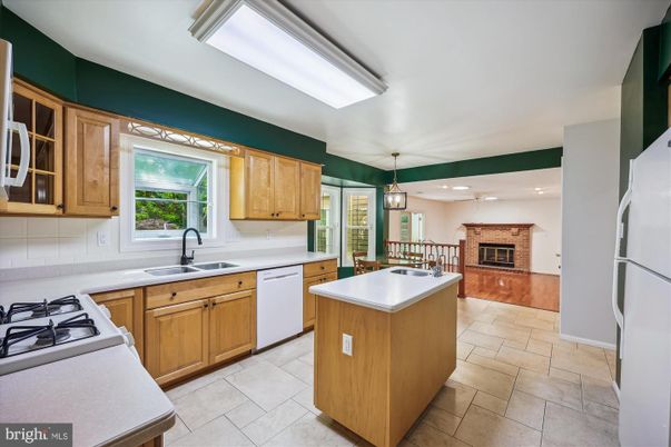 Dining room, Fireplace, Interior, Kitchen, Pendant Lights, Recessed Lighting, Stainless Steel Appliances, Stone Walls