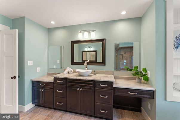 Bathroom, Dual Sink Vanities, Interior, Recessed Lighting, Wood Texture Flooring
