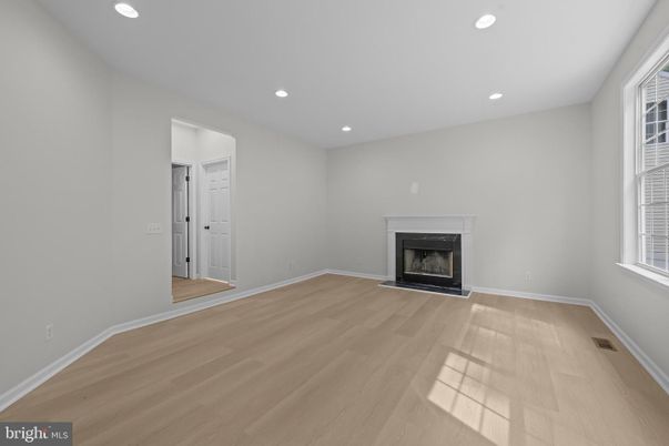 Empty room, Fireplace, Interior, Recessed Lighting, Wood Texture Flooring
