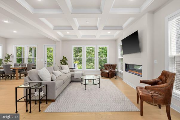 Dining room, Fireplace, Interior, Living room, Recessed Lighting, Wood Texture Flooring