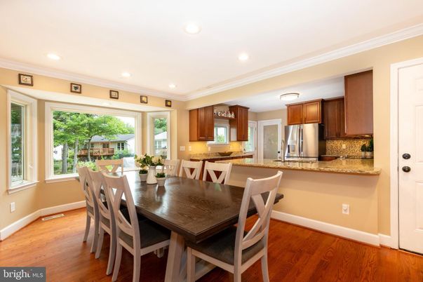 Dining room, Interior, Kitchen, Recessed Lighting, Stainless Steel Appliances, Wood Texture Flooring