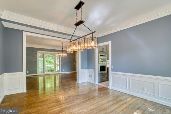 Chandelier, Empty room, Interior, Kitchen, Pendant Lights, Stainless Steel Appliances, Wood Texture Flooring