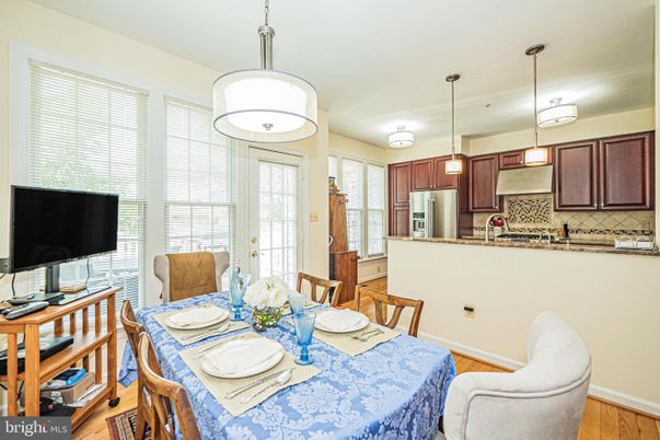 Dining room, Interior, Kitchen, Pendant Lights, Stainless Steel Appliances, Wood Texture Flooring