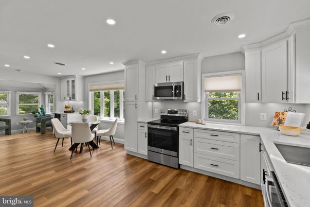 Dining room, Interior, Kitchen, Recessed Lighting, Stainless Steel Appliances, Wood Texture Flooring