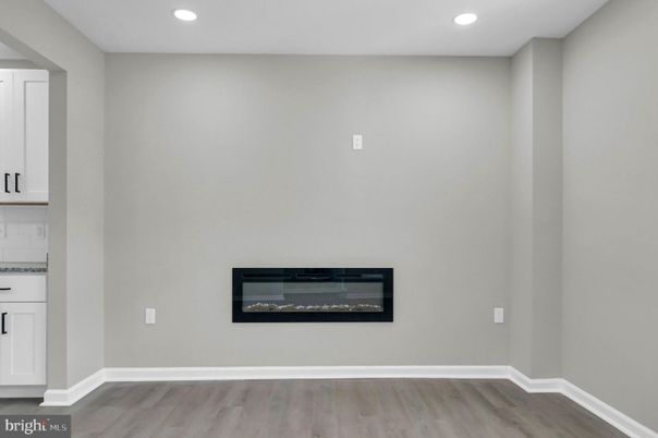 Empty room, Fireplace, Interior, Recessed Lighting, Wood Texture Flooring