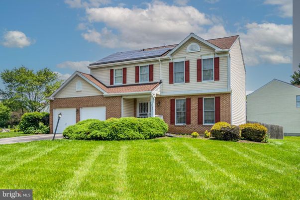 Attached, Exterior, Facade, Brick Facade, Solar Panels, Split Level