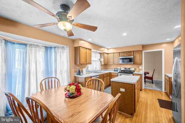 Dining room, Interior, Kitchen, Recessed Lighting, Stainless Steel Appliances, Wood Texture Flooring