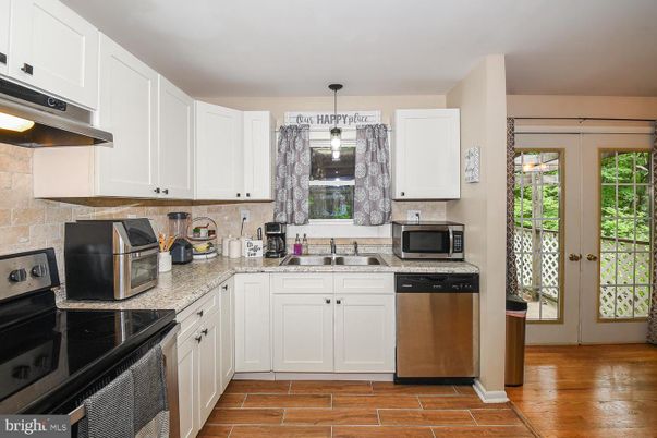 Interior, Kitchen, Pendant Lights, Stainless Steel Appliances, Wood Texture Flooring