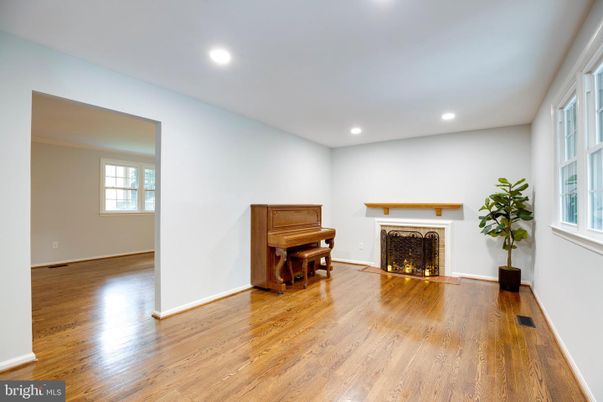 Fireplace, Interior, Piano, Recessed Lighting, Wood Texture Flooring