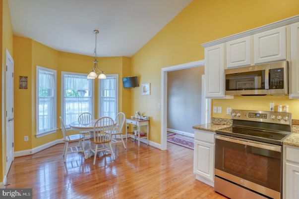 Dining room, Interior, Kitchen, Pendant Lights, Stainless Steel Appliances, Wood Texture Flooring