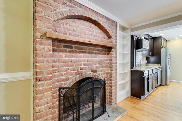 Fireplace, Interior, Kitchen, Recessed Lighting, Stone Walls, Wood Texture Flooring