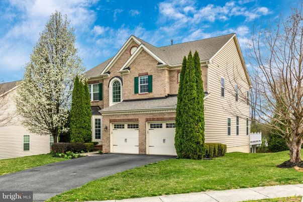 Attached, Exterior, Facade, Brick Traditional