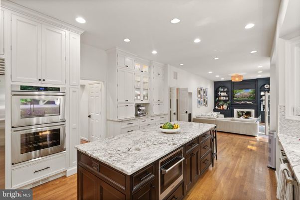 Fireplace, Interior, Kitchen, Living room, Recessed Lighting, Stainless Steel Appliances, Wood Texture Flooring