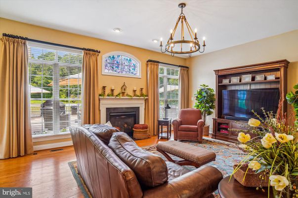 Chandelier, Fireplace, Interior, Living room, Recessed Lighting, Wood Texture Flooring