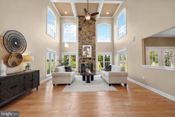 Fireplace, Interior, Living room, Recessed Lighting, Stone Walls, Wood Texture Flooring