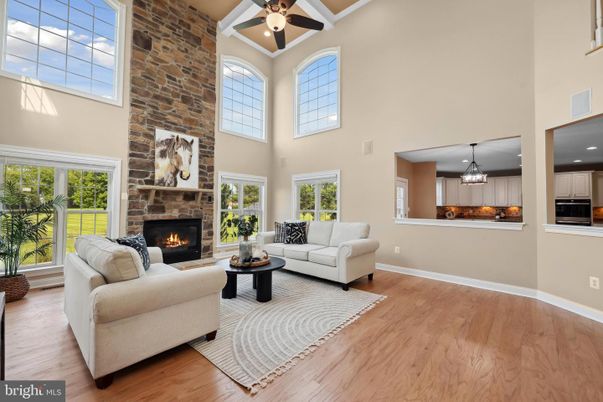 Chandelier, Fireplace, Interior, Living room, Stone Walls, Wood Texture Flooring