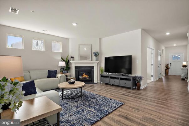 Fireplace, Interior, Living room, Recessed Lighting, Wood Texture Flooring