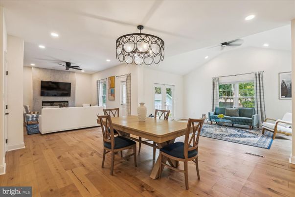 Chandelier, Dining room, Fireplace, Interior, Living room, Recessed Lighting, Wood Texture Flooring