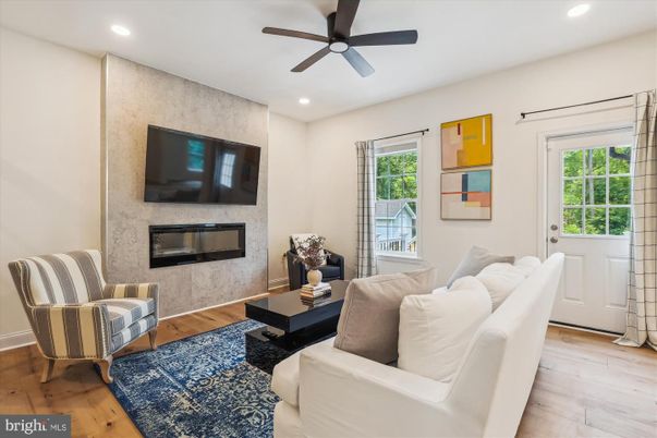 Fireplace, Interior, Living room, Recessed Lighting, Wood Texture Flooring