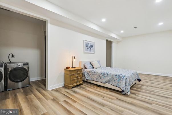 Bedroom, Interior, Recessed Lighting, Washer, Wood Texture Flooring
