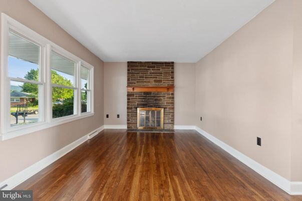 Empty room, Fireplace, Interior, Stone Walls, Wood Texture Flooring