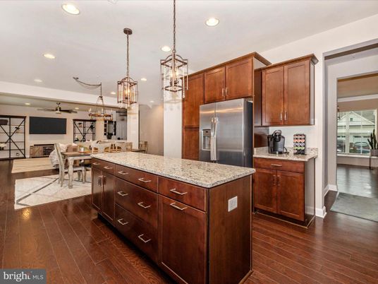 Chandelier, Dining room, Interior, Kitchen, Pendant Lights, Recessed Lighting, Stainless Steel Appliances, Wood Texture Flooring