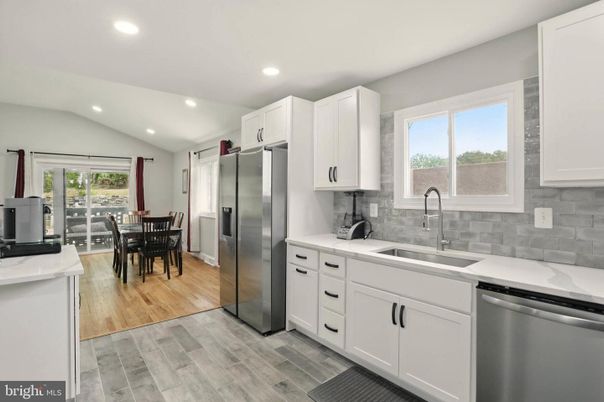 Dining room, Interior, Kitchen, Recessed Lighting, Stainless Steel Appliances, Wood Texture Flooring