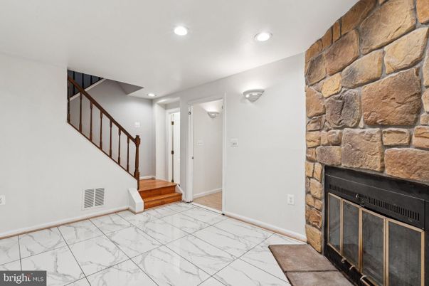 Fireplace, Interior, Marble, Recessed Lighting, Stone Walls