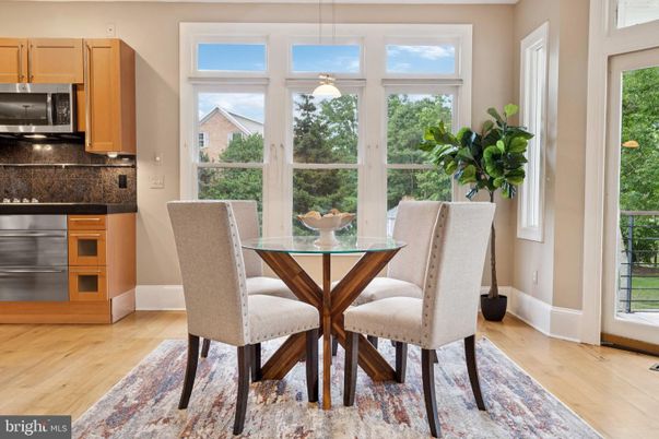Dining room, Interior, Kitchen, Pendant Lights, Stainless Steel Appliances, Wood Texture Flooring