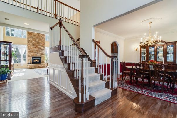 Chandelier, Dining room, Fireplace, Interior, Recessed Lighting, Wood Texture Flooring