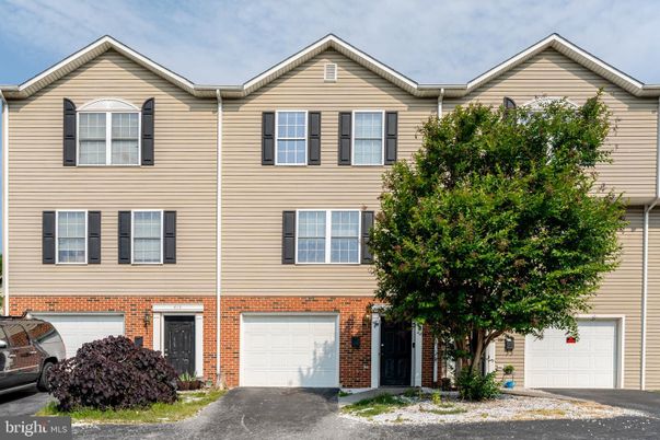 Attached, Exterior, Facade, Brick Facade, Rowhouse
