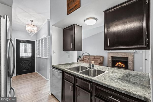 Chandelier, Fireplace, Interior, Kitchen, Wood Texture Flooring