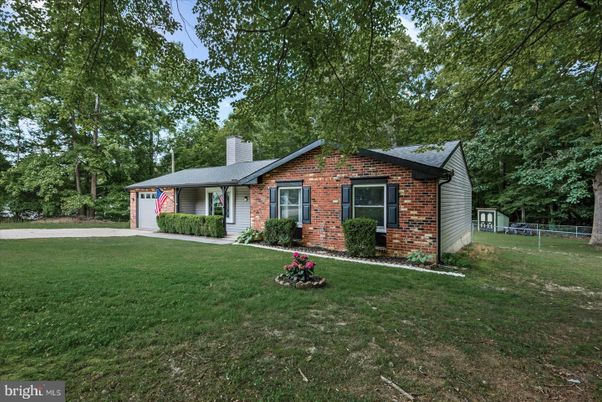 Attached, Backyard, Exterior, Facade, Brick Facade, Ranch