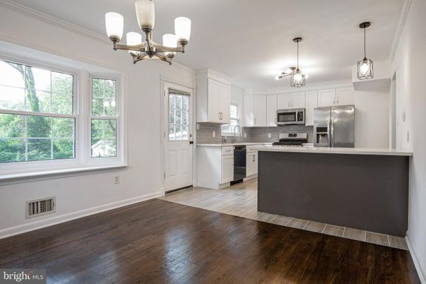 Chandelier, Interior, Kitchen, Pendant Lights, Stainless Steel Appliances, Wood Texture Flooring