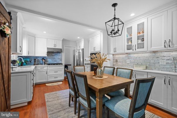 Dining room, Interior, Kitchen, Pendant Lights, Recessed Lighting, Stainless Steel Appliances, Wood Texture Flooring
