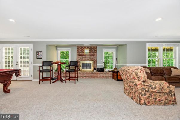 Billiard Table, Fireplace, Game Room, Interior, Living room, Recessed Lighting, Stone Walls