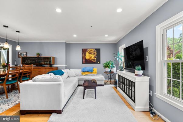 Dining room, Fireplace, Interior, Living room, Pendant Lights, Recessed Lighting, Wood Texture Flooring