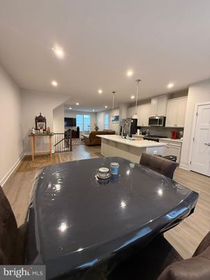 Dining room, Interior, Kitchen, Living room, Pendant Lights, Recessed Lighting, Wood Texture Flooring
