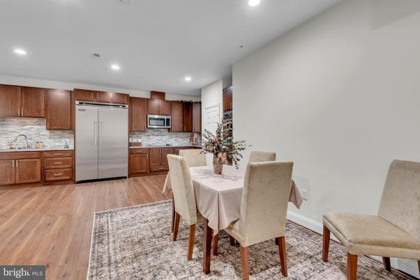 Dining room, Interior, Kitchen, Recessed Lighting, Stainless Steel Appliances, Wood Texture Flooring