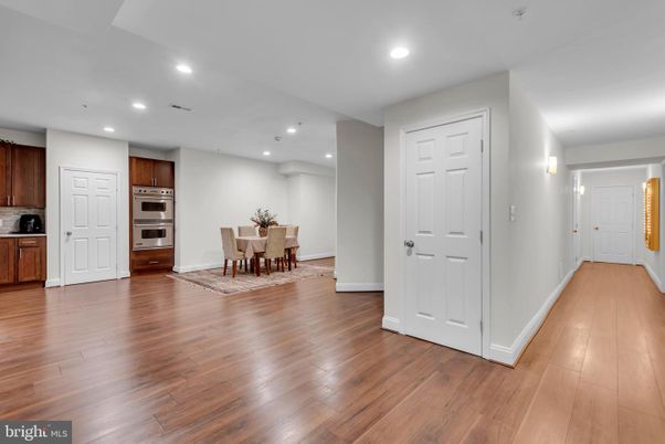 Dining room, Interior, Kitchen, Recessed Lighting, Stainless Steel Appliances, Wood Texture Flooring