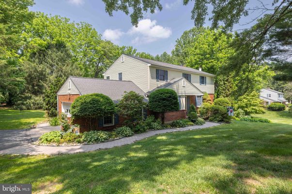 Attached, Backyard, Exterior, Facade, Brick Facade, Tudor Revival