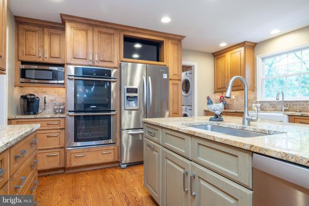 Interior, Kitchen, Recessed Lighting, Stainless Steel Appliances, Washer, Wood Texture Flooring