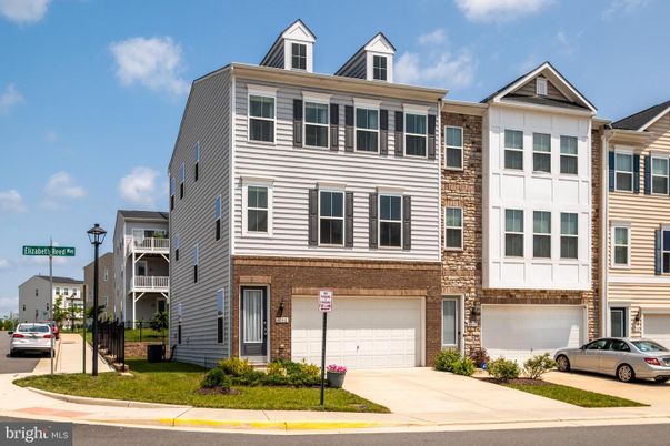 Attached, Exterior, Facade, Brick Facade, Rowhouse