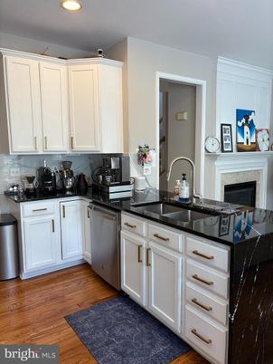 Fireplace, Interior, Kitchen, Recessed Lighting, Wood Texture Flooring