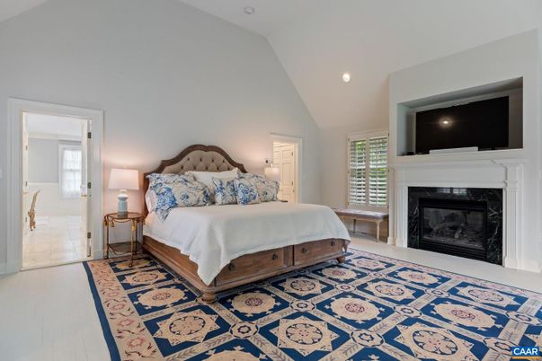 Bedroom, Fireplace, Interior, Recessed Lighting, Wood Texture Flooring