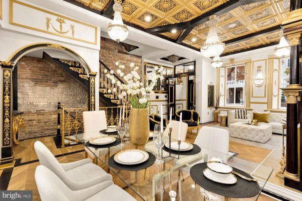 Chandelier, Dining room, Fireplace, Interior, Pendant Lights, Recessed Lighting, Stone Walls, Wood Texture Flooring