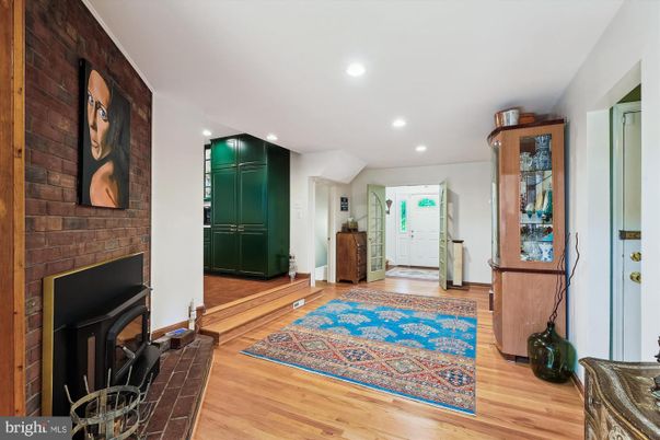 Fireplace, Interior, Recessed Lighting, Stone Walls, Wood Texture Flooring