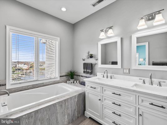 Bathroom, Dual Sink Vanities, Interior, Recessed Lighting, Wood Texture Flooring